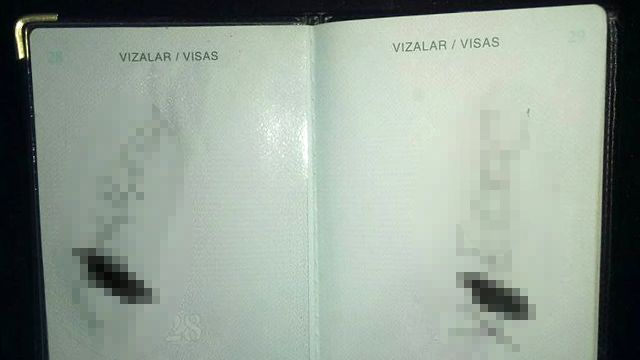 В Санкт-Петербурге люди в форме написали в паспорте дворника матерные слова